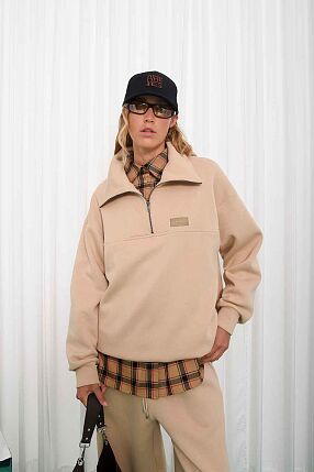 SELFHOOD ZIPPED SWEATER
